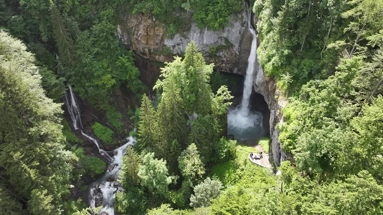 Aerial view of Bergli Stüber Waterfall in Fätschbach, Glarus Süd, Schweiz, capturing the daytime sunshine scene of this natural gem