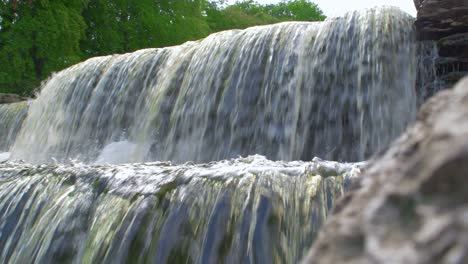 beautiful flowing waterfall cascade yorkshire on sunny day 3