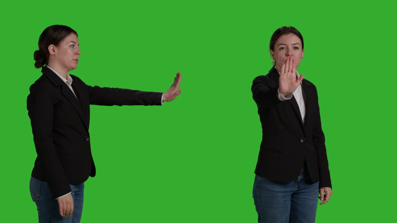 Businesswoman Making Stop Gesture on Green Screen