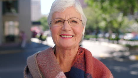 Portrait-of-a-laughing-older-woman-looking-happy