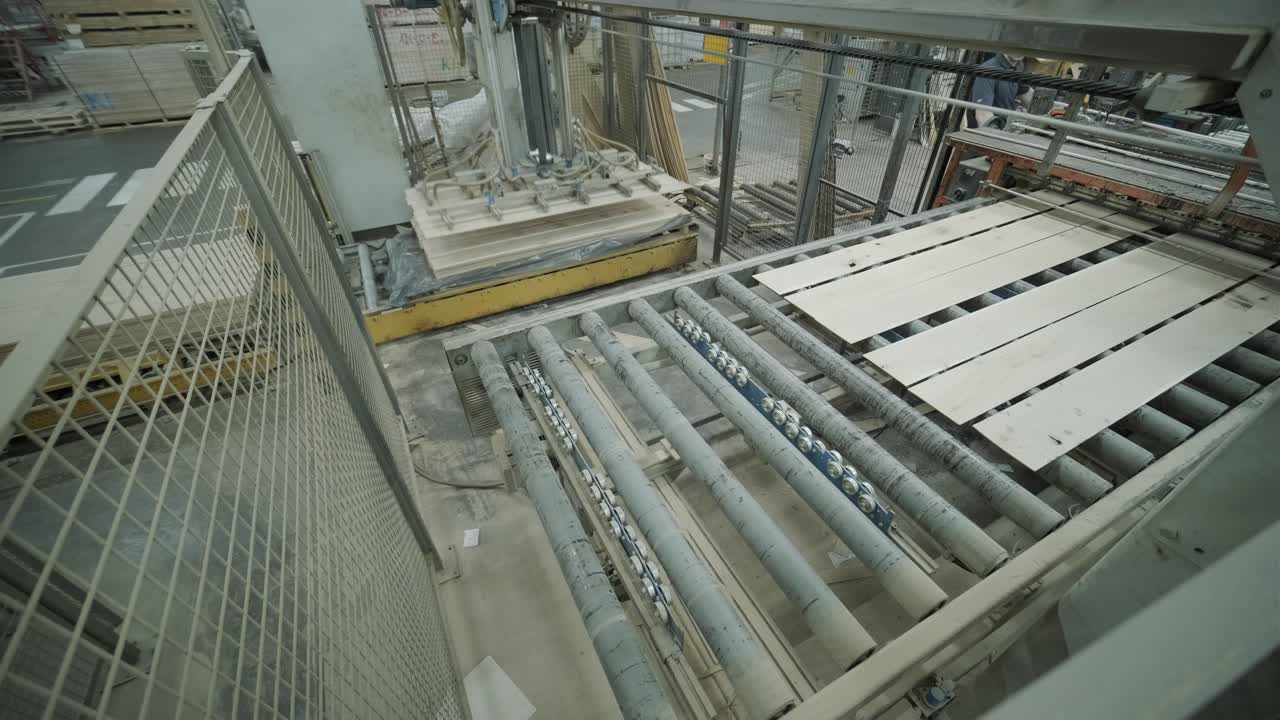 Automated Machine Stacking Wooden Planks on a Production Line