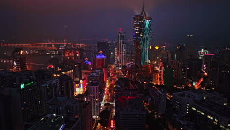 an aerial view of a city at night