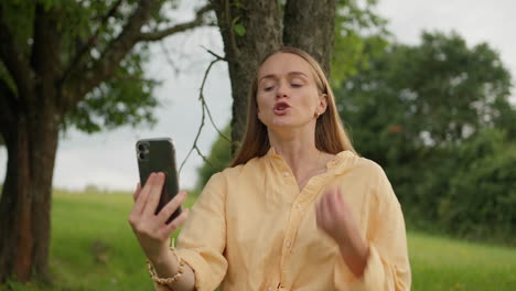 Young-Woman-arguing-on-Mobile-Phone