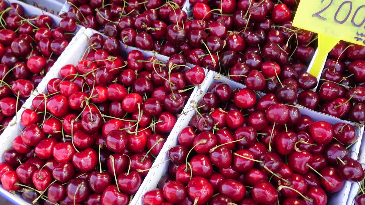 Fresh Cherries at Market Stall