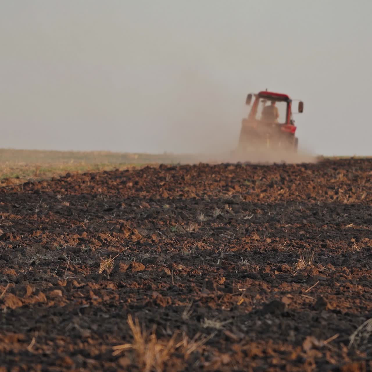 Tractor ploughing a field