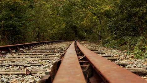 low angle focus pull of disused railway tracks on anglesey, north wales