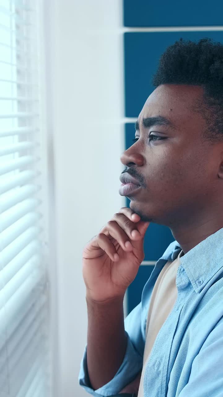 Contemplating life changes while gazing out the window in a calm setting