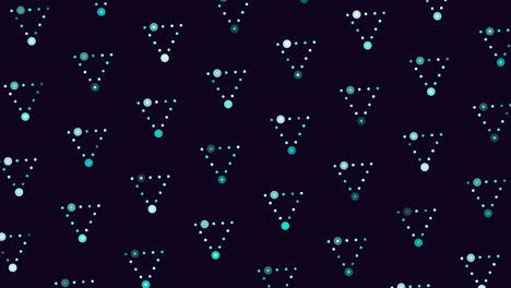 abstract triangle pattern of green dots on black background