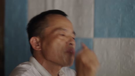man playing bamboo flute and interview