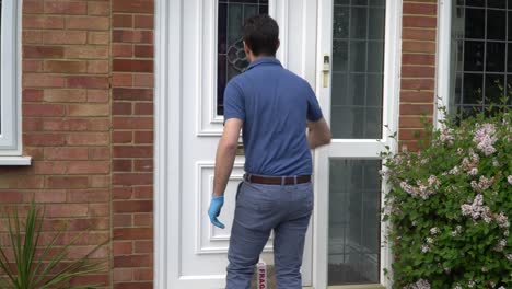 courier delivering parcel during quarantine