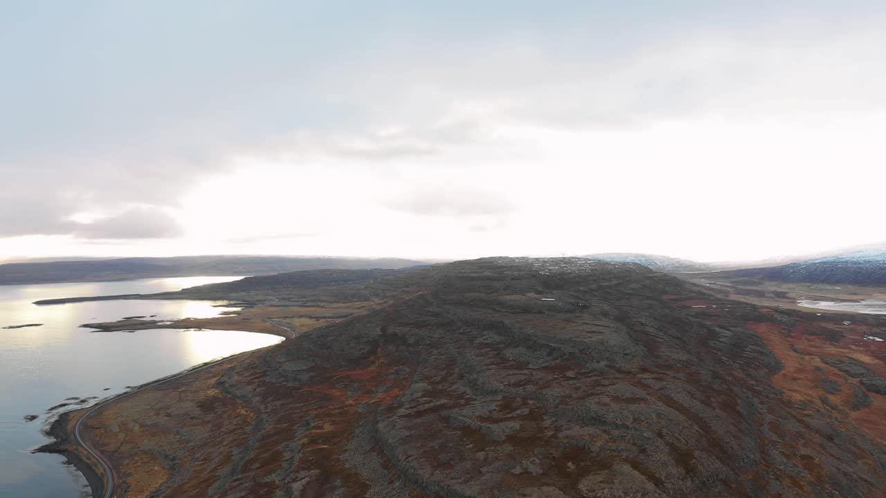 Sensational drone Flight over Uninhibited Rocky Hilly Terrain by the Coastline in Westfjords, Iceland, wilderness