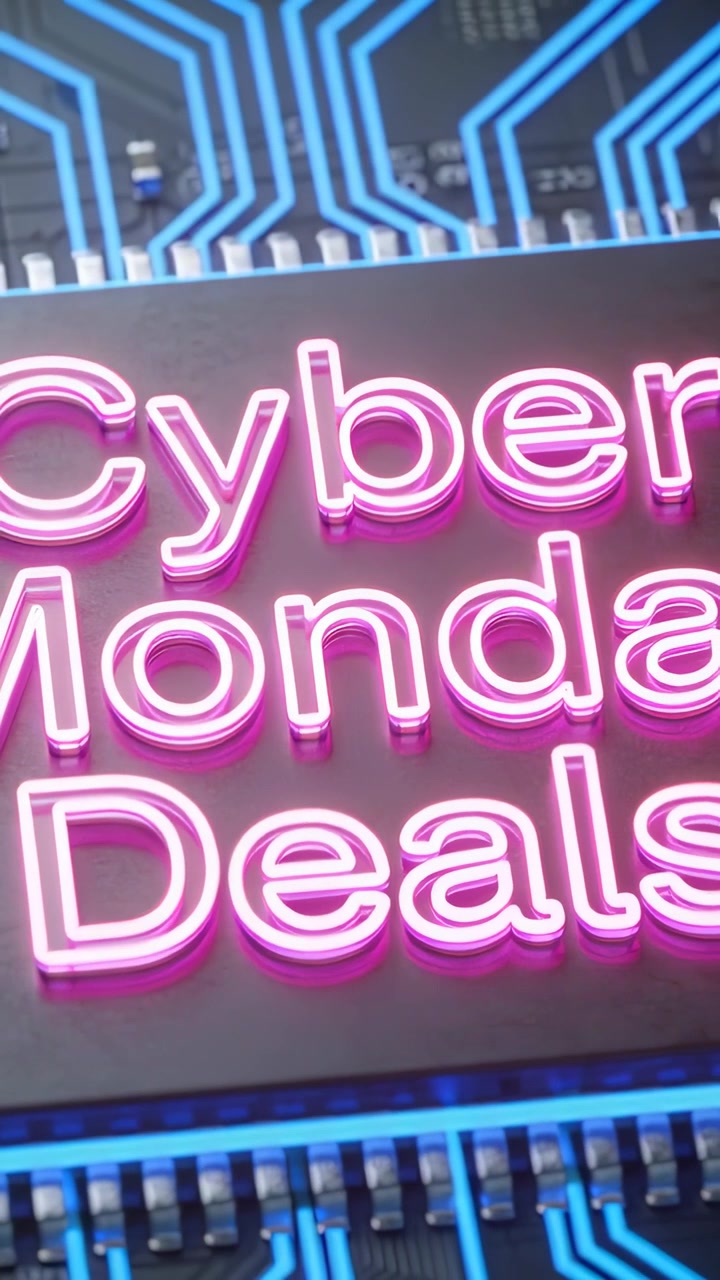 Vertical video: Sliding camera revealing neon Cyber Monday Deals sign above blue PCB with pins
