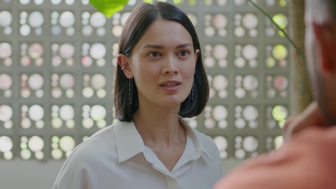 Business People Discussing Project in Coworking Cafe