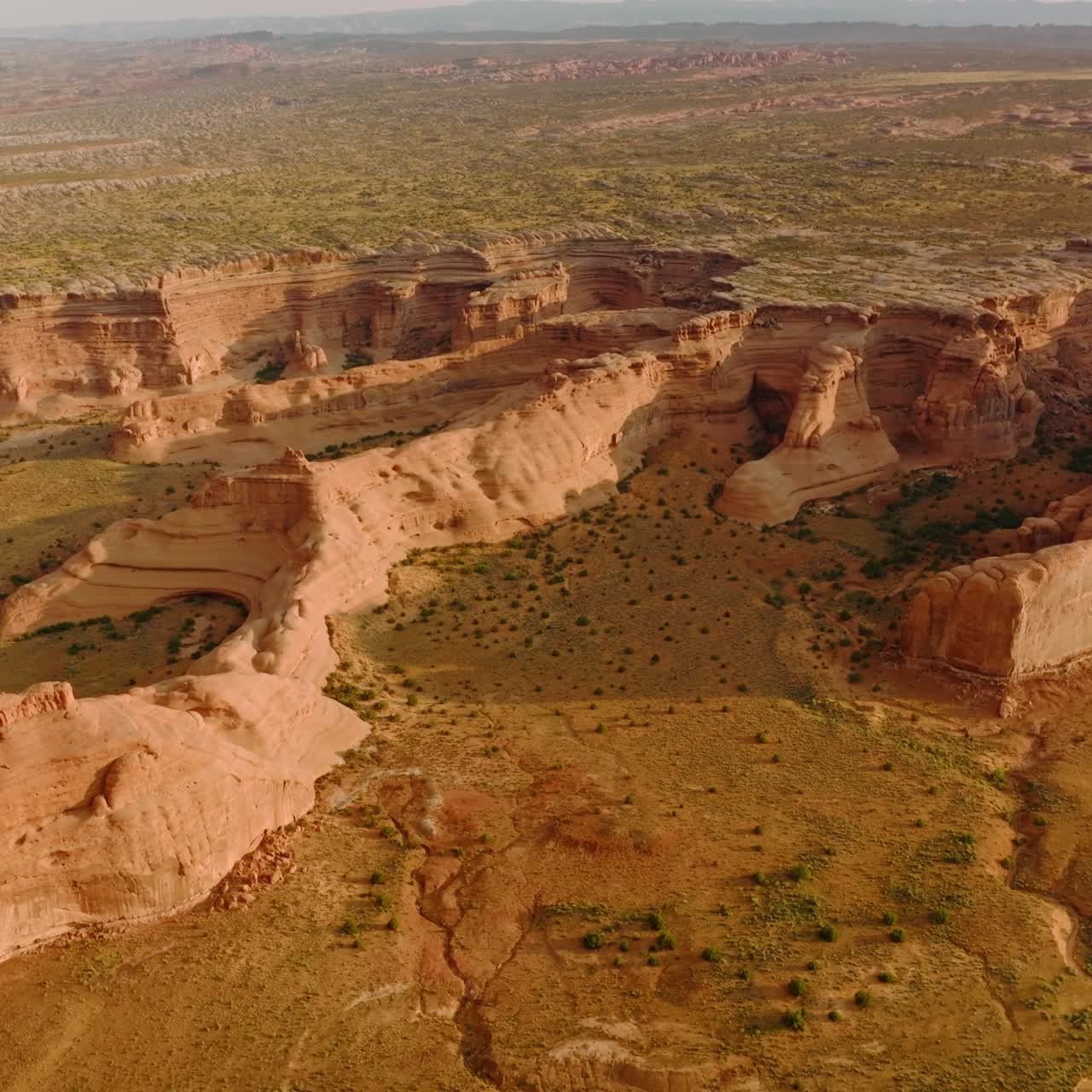 Amazing rock formations from air erosion in huge desert. Arches National park in Utah, USA from aerial perspective on sunny day