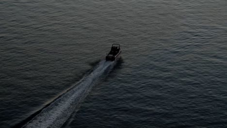 Fishing-Boat-cruising-at-Sunrise