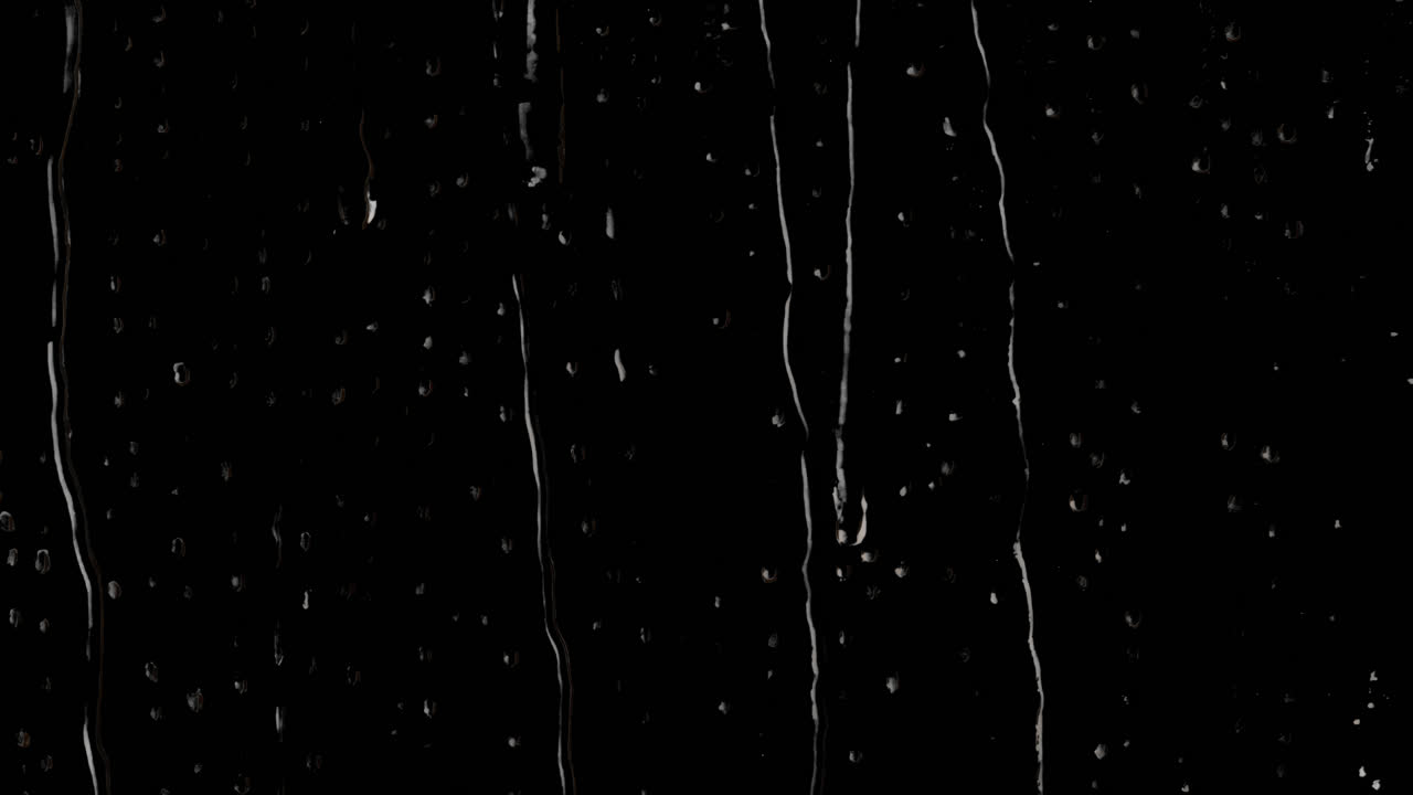 Dark raindrops on glass animated overlay, transparent 4K video, alpha channel, ProRes 4444