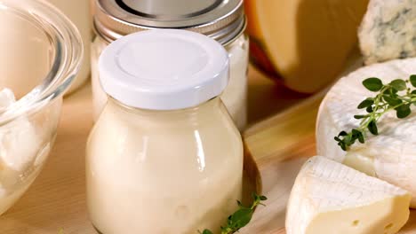 various dairy items arranged on a black background