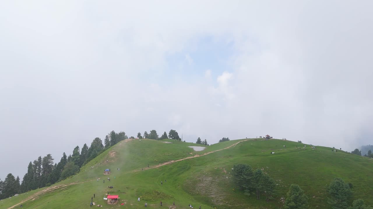 Drone Flyover of Mushkpuri Top | Aerial View of Green Meadows And Clouds