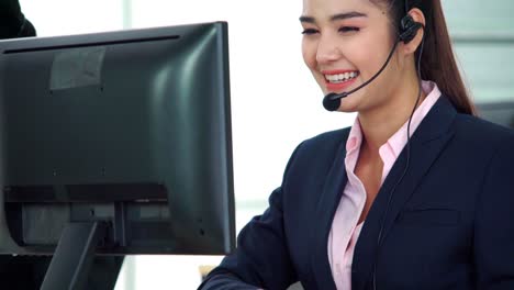 business people wearing headset working in office