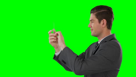 Businessman-pretending-to-use-mobile-phone