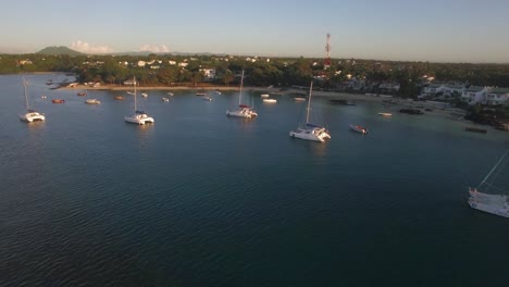 Flying-over-yachts-and-houses-on-Mauritius-coast