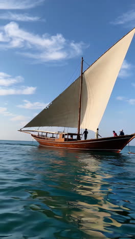 traditional dhow sailing on the ocean