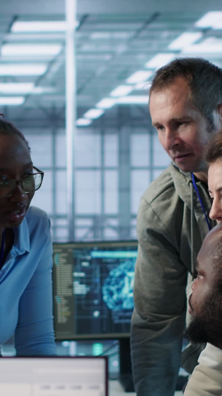 Diverse Team of Engineers Collaborating and Smiling in Tech Office