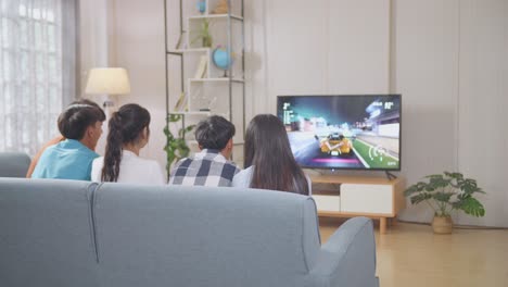 friends watching a video game