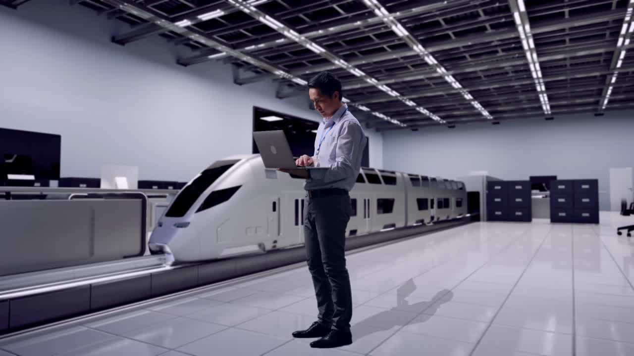 Full Body Side View Of An Asian Male Professional Worker Standing With His Laptop, Futuristic High-Speed Train in a Modern Testing Facility, Typing On His Laptop'S Keybaord With Meditation