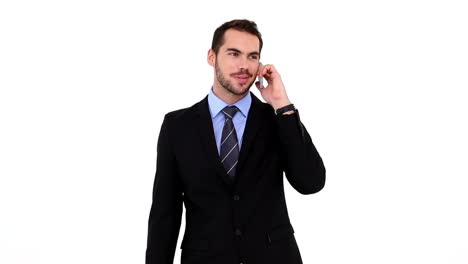 Young-businessman-talking-on-his-phone