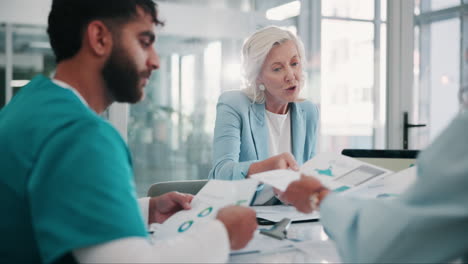 businesswoman leading a meeting with two men