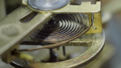 watch mechanism macro loop.old vintage clock mechanism working, closeup shot with soft focus.close up of a internal clock mechanism.vintage watch gears movement macro