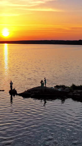 aerial view landscape nature. aerial shot of sunset over river in the countryside vertical video