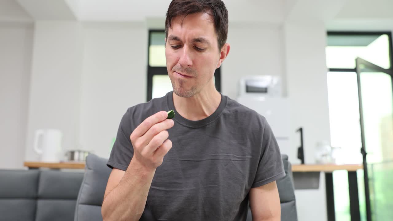 Man eating food indoors