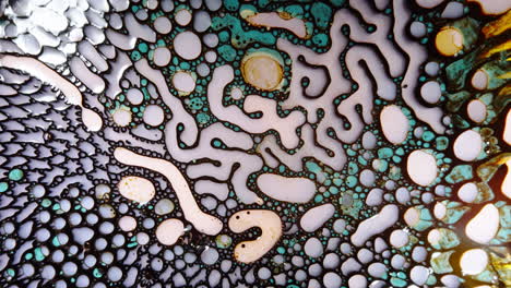 Abstract macro shot of colorful liquid patterns forming organic shapes and textures