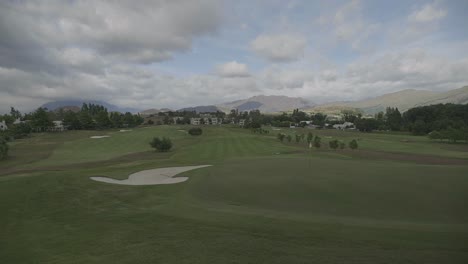 Golf-field-with-a-flag-on-the-distance