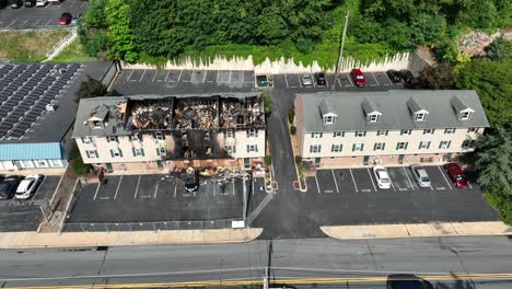 An-apartment-complex-with-a-unit-burned-and-collapsed-after-fire