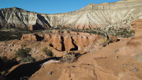 aerial push in through arid landscape of kodachrome basin state park, utah