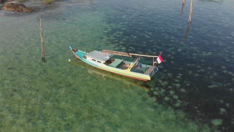 flying towards traditional fishing boat at belitung indonesia, aerial