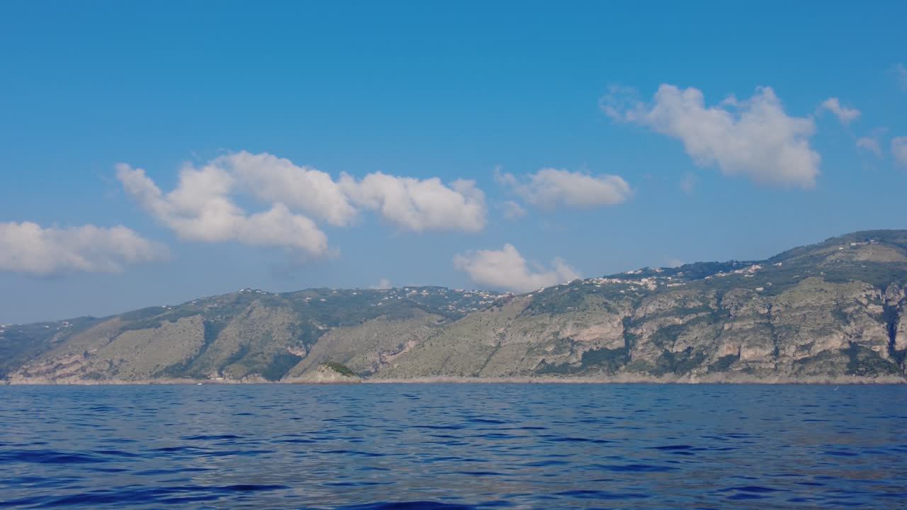 Mountains And Blue Ocean Near Amalfi Coast View From A Cruising Ferry In Tyrrhenian Sea, Italy
