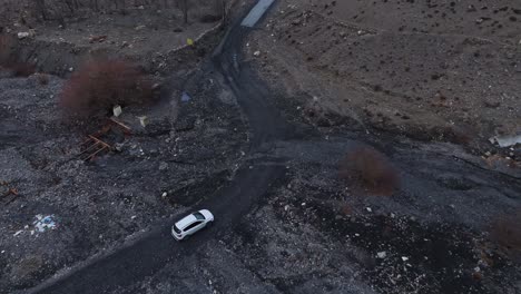 aerial view of a damaged mountain road and valley