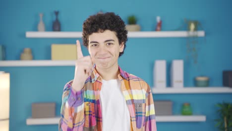 a teenage boy who finds a good idea is happy.