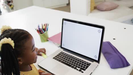 African-american-brother-and-sister-in-online-class-using-laptop-with-copy-space,-slow-motion