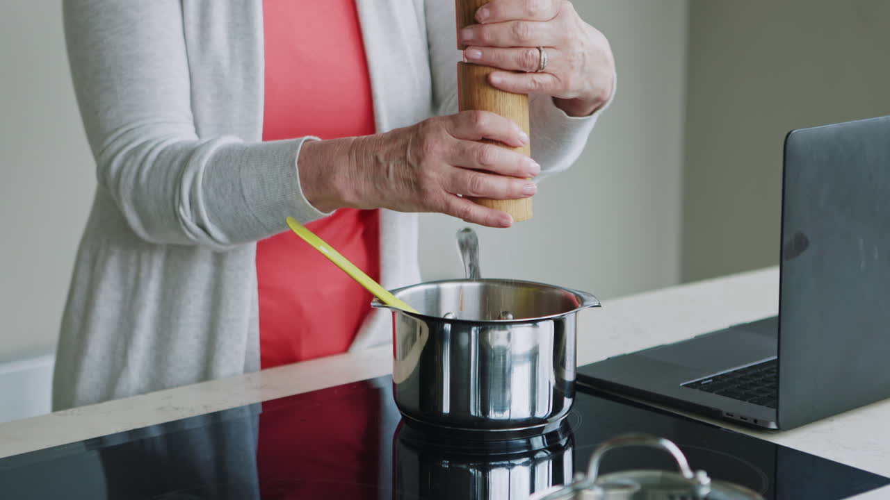 A woman cooking indoors
