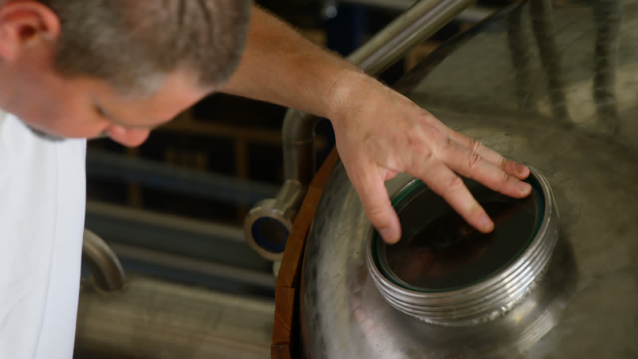 Male worker working in factory 4k