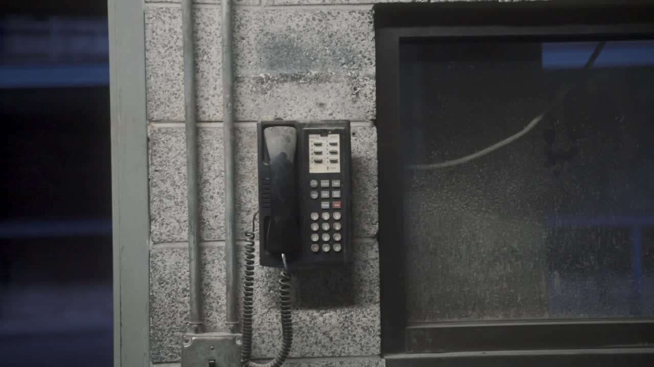 Empty Chicago warehouse wall telephone