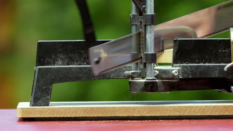 Cutting-a-picture-frame-moulding-with-a-Miter-Saw