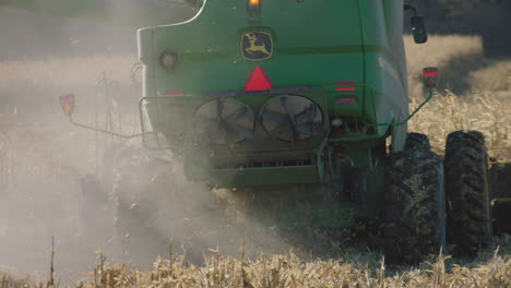 combine harvester, sunny day, slow motion