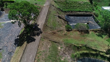 aerial video of sewage treatment plant, residential retention ponds around green area in residential condominium, costa rica