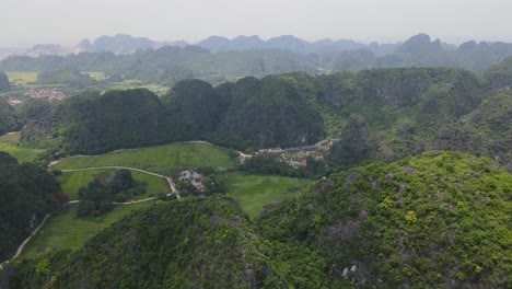 Aerial View of Lush Green Mountains and Valley in Vietnam